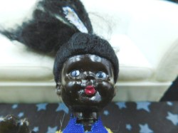 black dollhouse yellow face